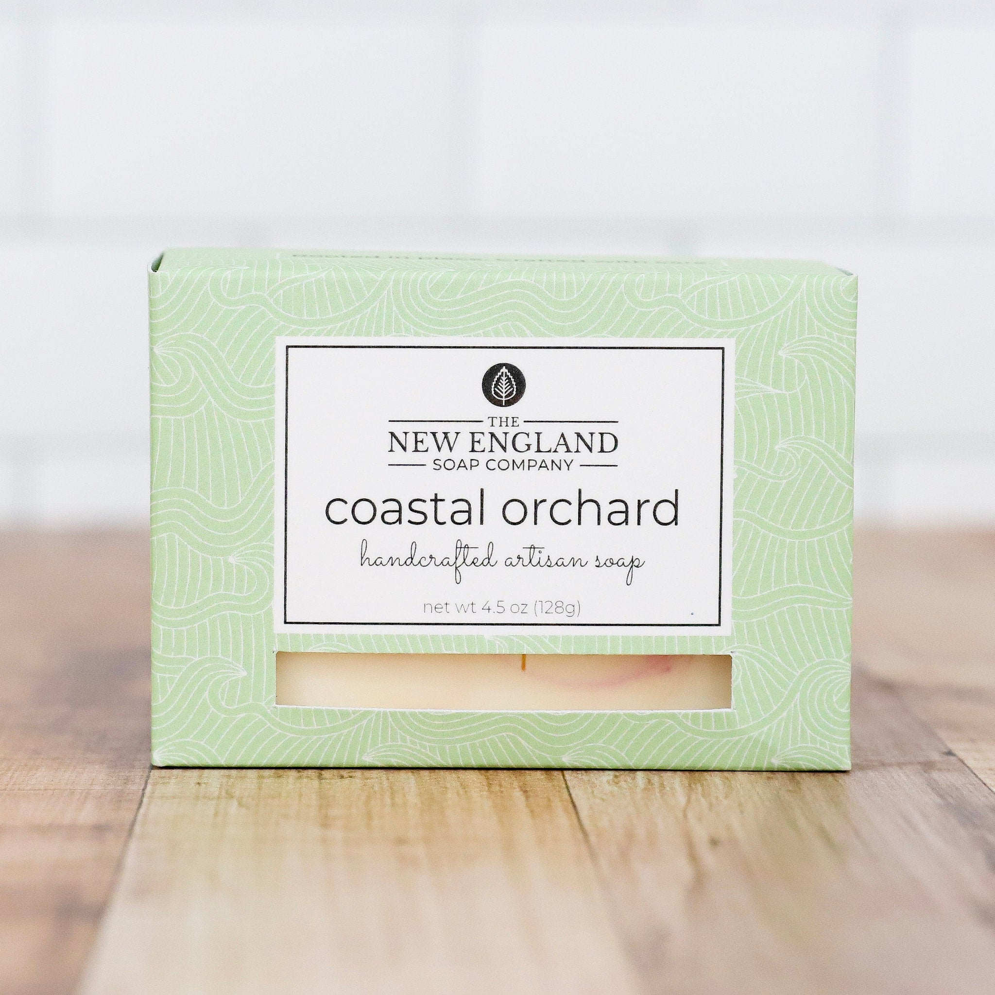 Box of New England Soap Company coastal orchard soap on a wooden surface