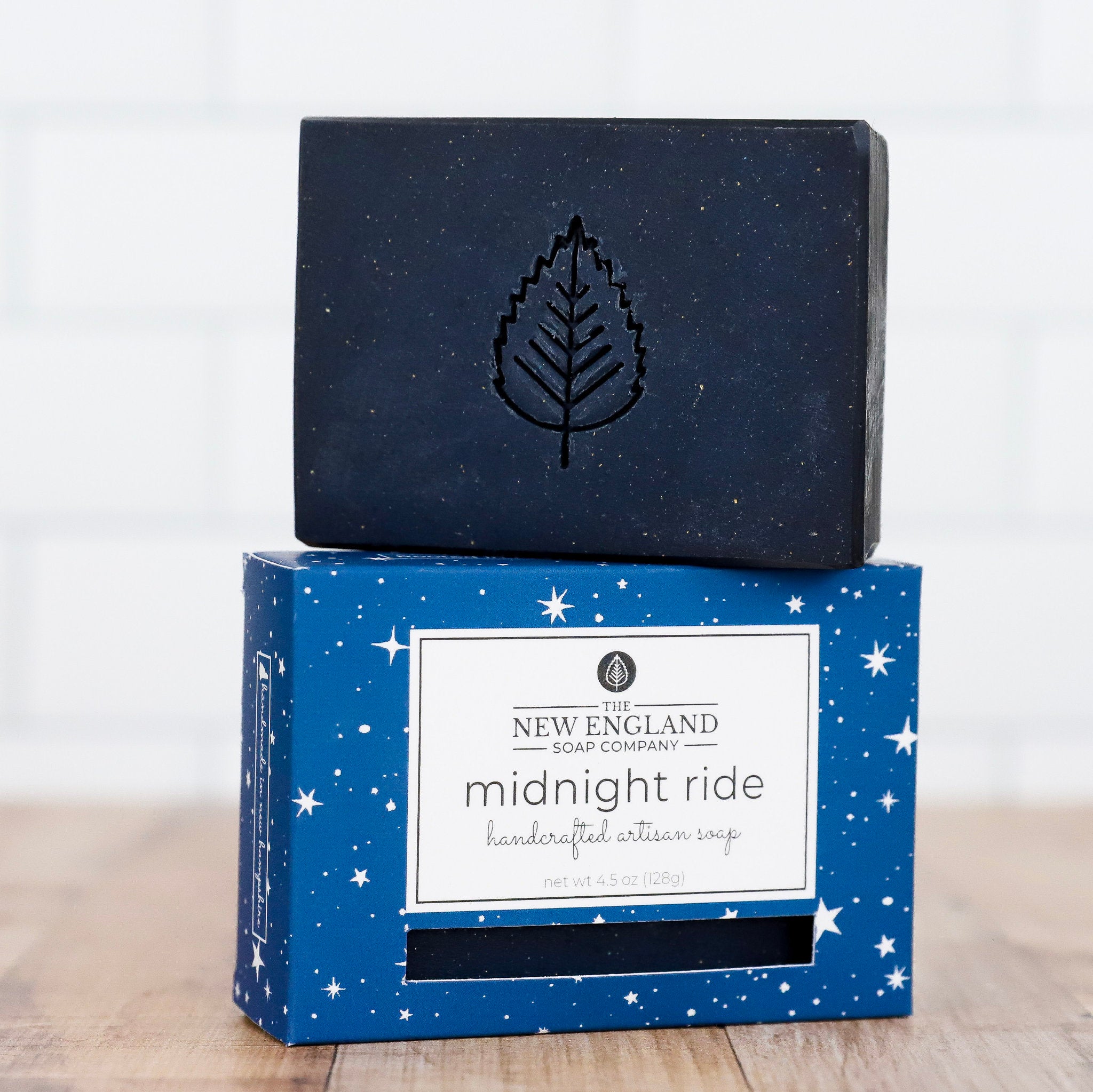 Bar of soap with a blue box featuring &