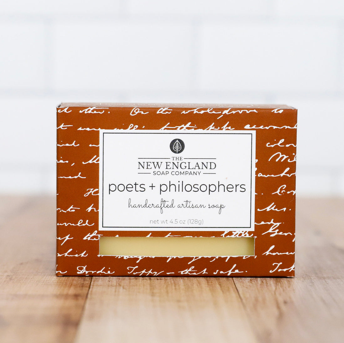 Box of New England Soap Company soap on a wooden surface with a white background Poets and Philosophers Artisan Soap